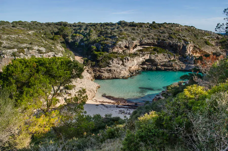 Cala Marmols: Secluded Beach Amidst Cliffs