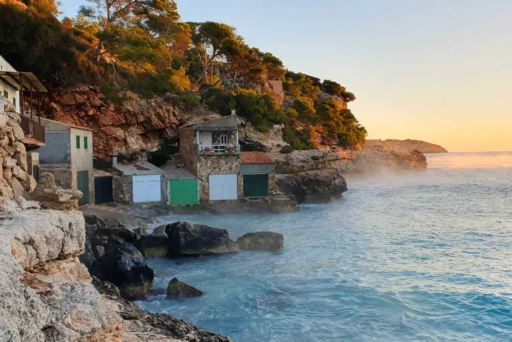 sunrise at the cala llombards beach in mallorca